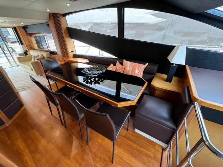  Yacht Photos Pics Luxurious interior of 2008 Sunseeker Manhattan 70 yacht with elegant dining area.