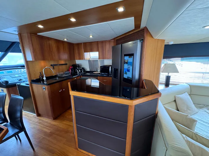  Yacht Photos Pics Luxurious kitchen interior of 2008 Sunseeker Manhattan 70 yacht with modern amenities.