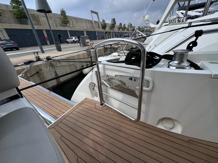  Yacht Photos Pics Luxury Sunseeker Manhattan 70 yacht, 2008 model, docked with teak deck and polished railings.