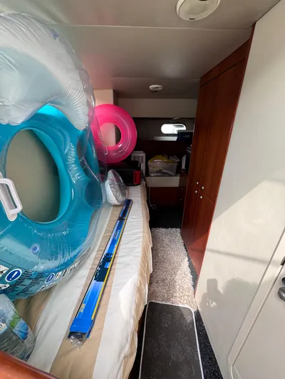  Yacht Photos Pics Interior of 2008 Sunseeker Manhattan 70 yacht with inflatables and storage space.