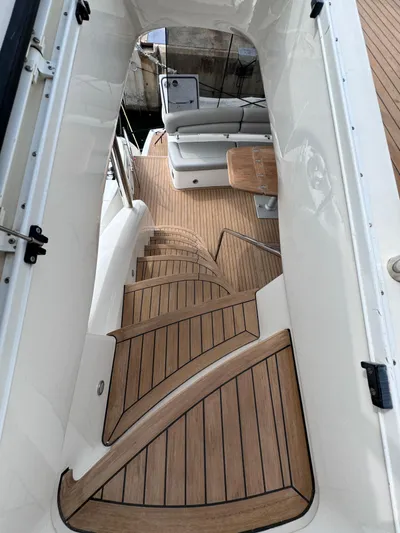  Yacht Photos Pics Staircase on 2008 Sunseeker Manhattan 70 yacht with teak decking.