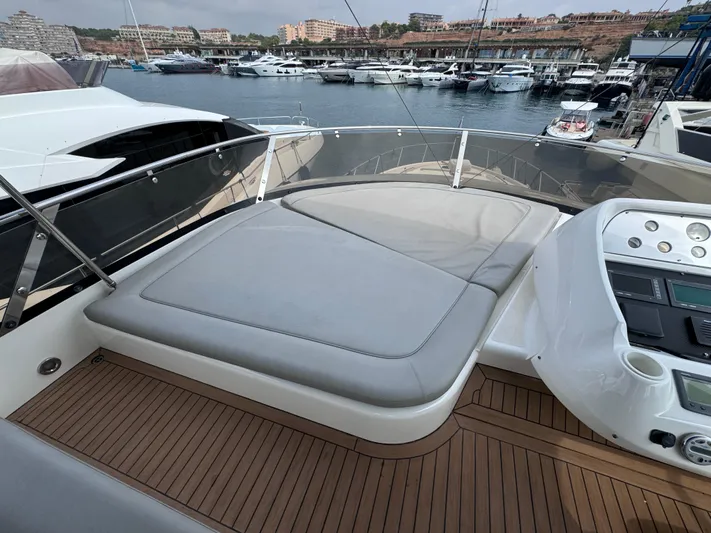 Yacht Photos Pics Sunseeker Manhattan 70 yacht deck with seating, overlooking marina, 2008 model.