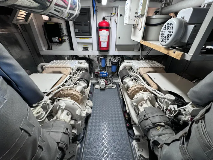  Yacht Photos Pics Engine room of 2008 Sunseeker Manhattan 70 yacht, featuring dual engines and safety equipment.