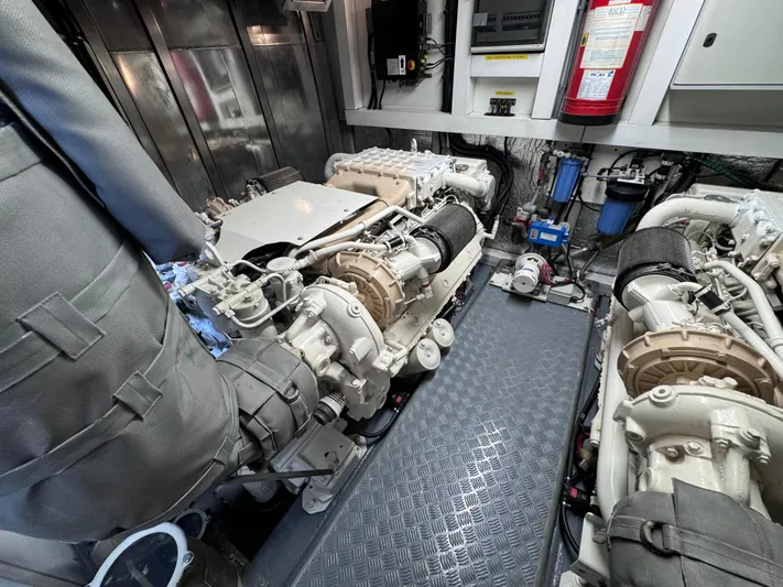  Yacht Photos Pics Engine room of 2008 Sunseeker Manhattan 70 yacht, featuring dual engines and safety equipment.