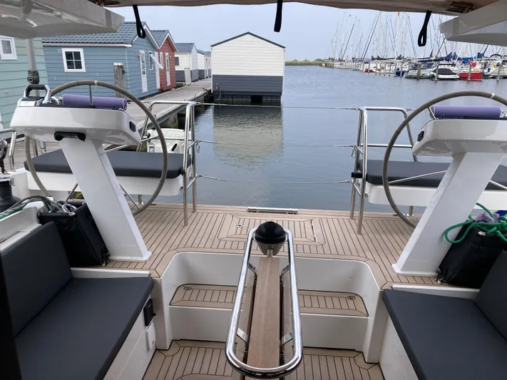  Yacht Photos Pics Cockpit view of 2022 Moody Decksaloon 41 yacht in marina setting.