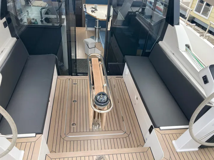  Yacht Photos Pics 2022 Moody Decksaloon 41 yacht cockpit with seating and compass.
