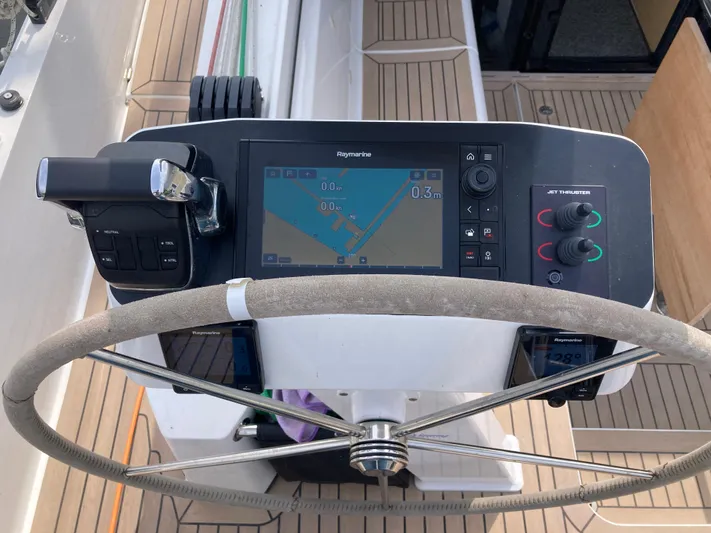  Yacht Photos Pics Steering wheel and navigation system on 2022 Moody Decksaloon 41 yacht.