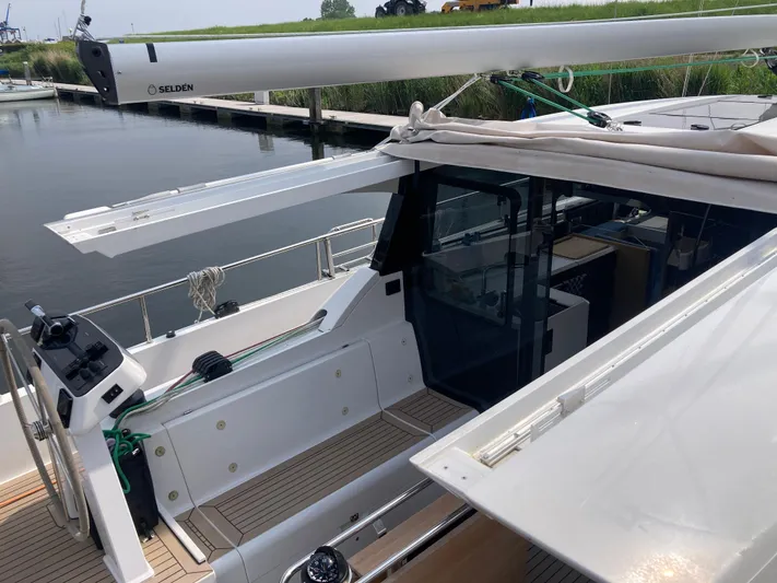  Yacht Photos Pics 2022 Moody Decksaloon 41 yacht with open cockpit and sleek design, docked by the water.