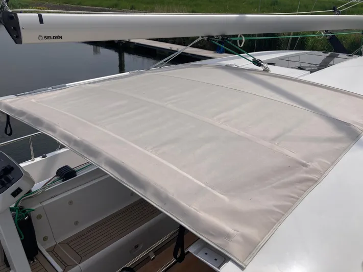  Yacht Photos Pics 2022 Moody Decksaloon 41 sailboat with a sunshade over the cockpit area.