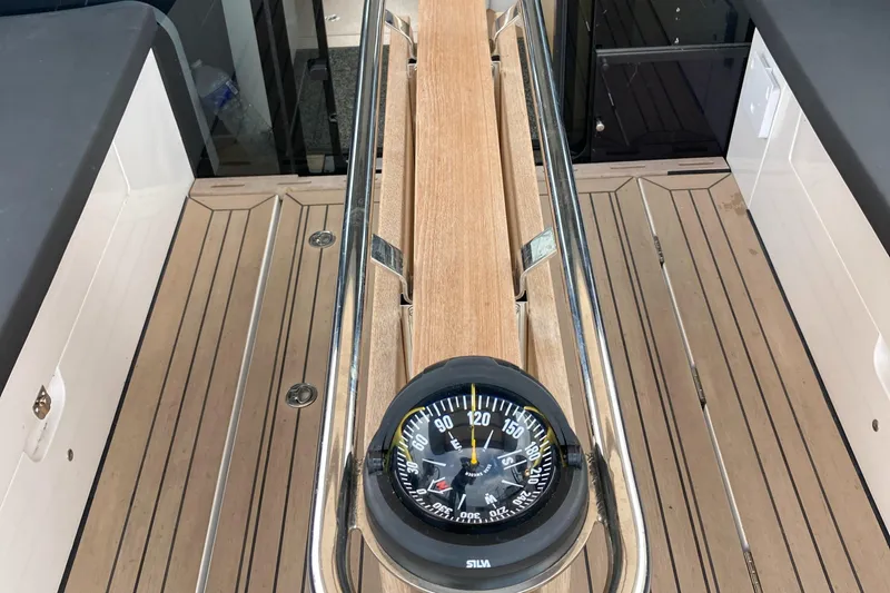  Yacht Photos Pics Compass on Moody Decksaloon 41 yacht, 2022 model, with teak decking and stainless steel railings.