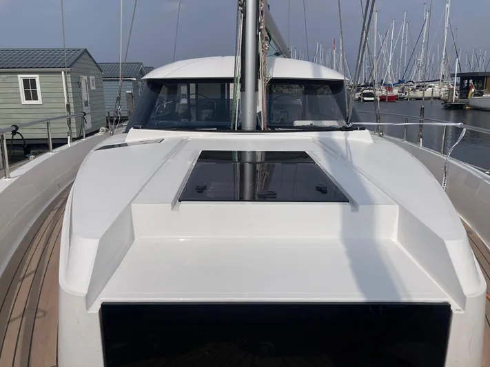  Yacht Photos Pics 2022 Moody Decksaloon 41 yacht docked in marina, showcasing sleek design and modern features.