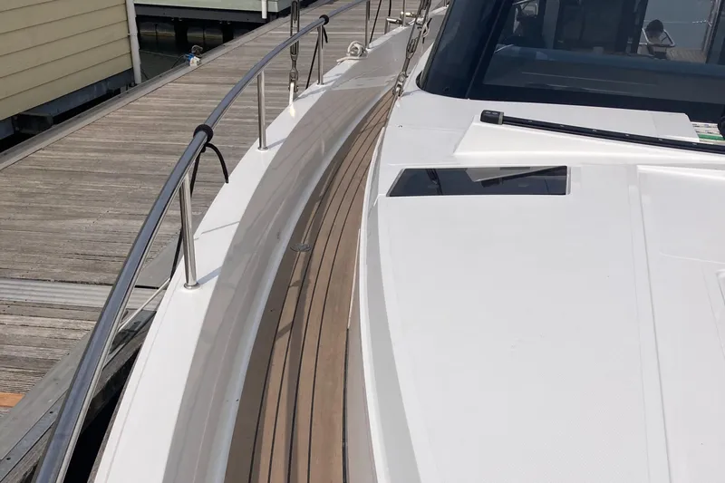  Yacht Photos Pics 2022 Moody Decksaloon 41 yacht with sleek deck design at marina.