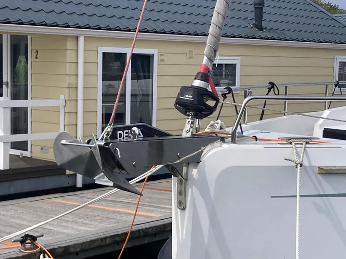  Yacht Photos Pics Moody Decksaloon 41 yacht bow with anchor, docked near yellow house, 2022 model.