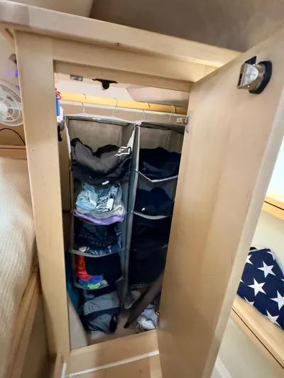  Yacht Photos Pics Compact closet with organized shelves in Aspen C108, 2026 model.