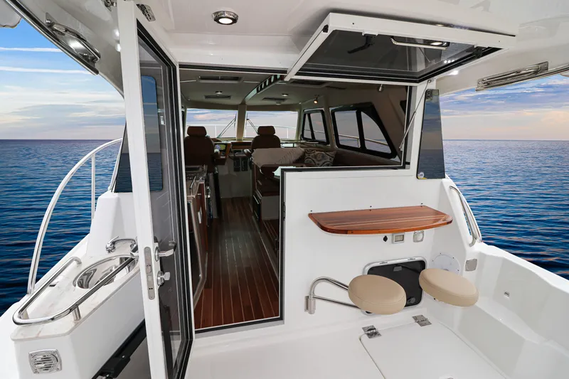  Yacht Photos Pics Modern Aspen C108 yacht interior with ocean view, featuring sleek design and comfortable seating, 2026 model.