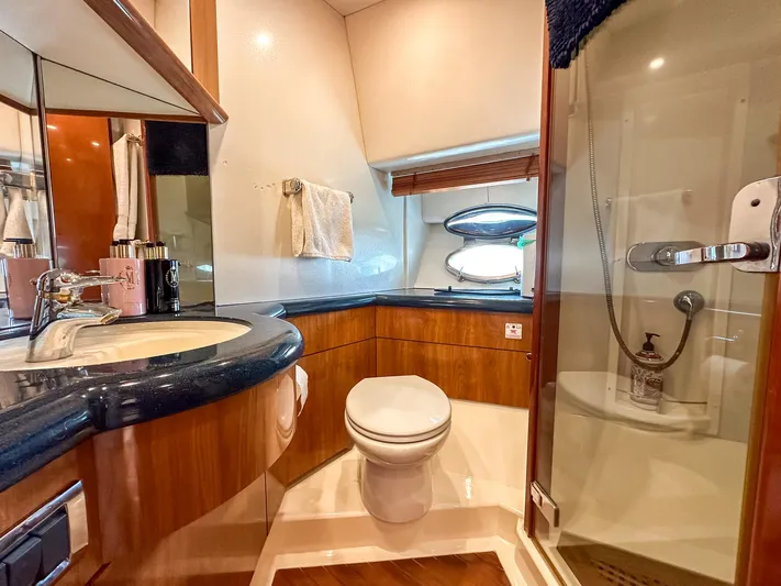 Shhmic Yacht Photos Pics Luxurious bathroom in 2001 Sunseeker Manhattan 74 yacht with modern amenities.