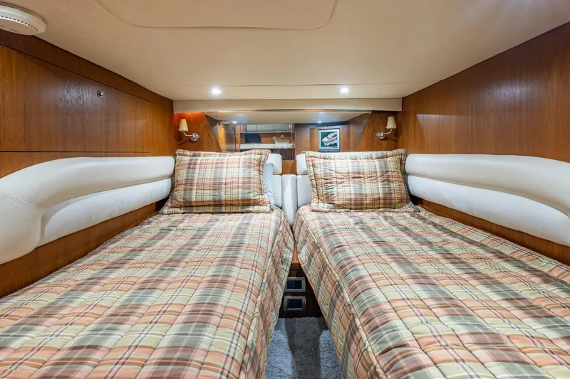  Yacht Photos Pics Interior of 2007 Tiara Yachts 4300 Sovran with twin beds and plaid bedding.