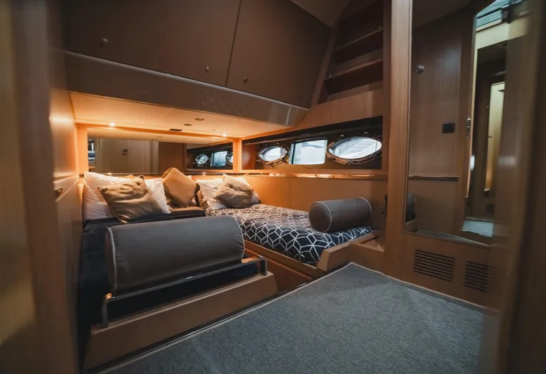  Yacht Photos Pics Luxurious cabin interior of 2011 Riva SportRiva 56 yacht with elegant bedding.