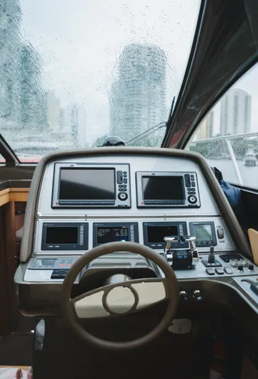  Yacht Photos Pics Cockpit view of 2011 Riva SportRiva 56 yacht with modern navigation equipment.