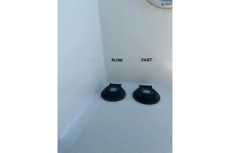  Yacht Photos Pics Control dials labeled "Slow" and "Fast" on a 2012 Lagoon 450 yacht.
