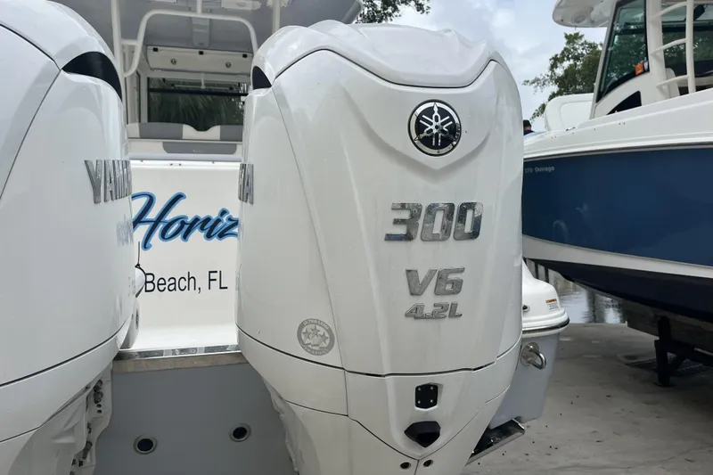 300 - 112 Brokerage Kevin Yacht Photos Pics 2023 Robalo R302 Center Console with Yamaha 300 V6 outboard engines, docked in Florida.