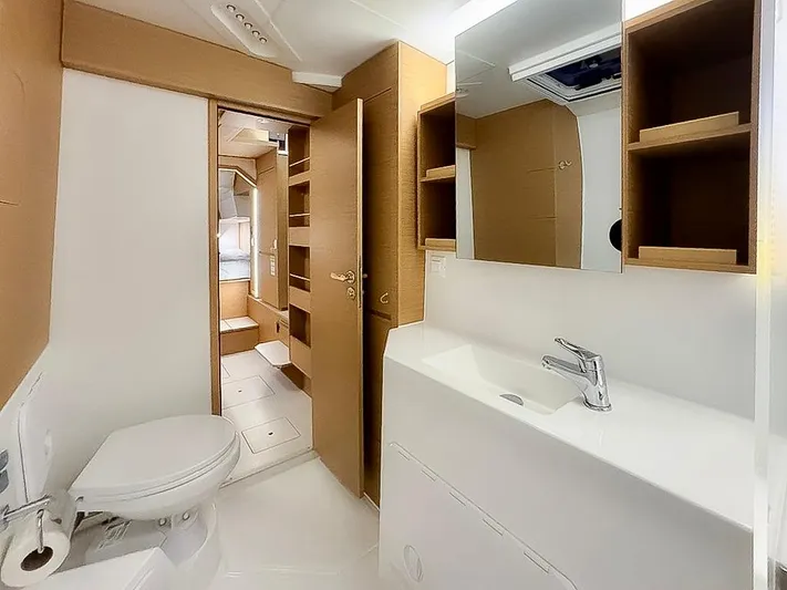 Eli X Yacht Photos Pics Modern bathroom interior in 2023 Excess 11 yacht, featuring sleek design and ample storage.