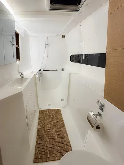 Eli X Yacht Photos Pics Modern bathroom in 2023 Excess 11 yacht with sleek design and wooden accents.