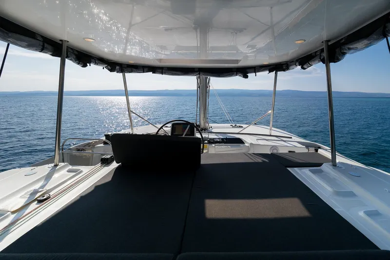 Almissa Yacht Photos Pics 2023 Lagoon 46 catamaran deck with ocean view and modern design.