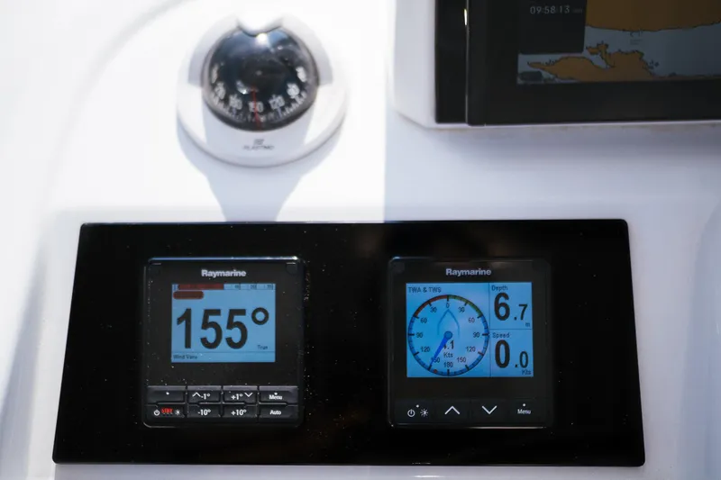 Almissa Yacht Photos Pics Navigation instruments on a 2023 Lagoon 46 catamaran, displaying compass and speed data.
