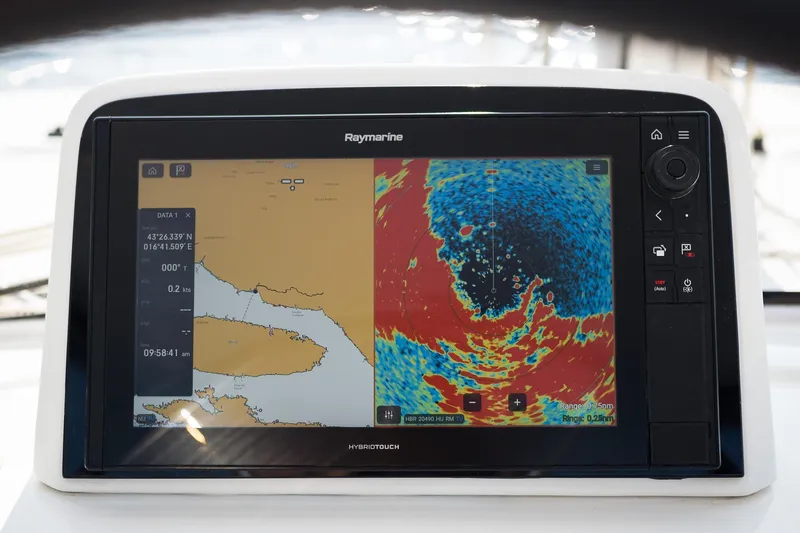 Almissa Yacht Photos Pics Raymarine navigation display on 2023 Lagoon 46 catamaran, showing nautical charts and radar.