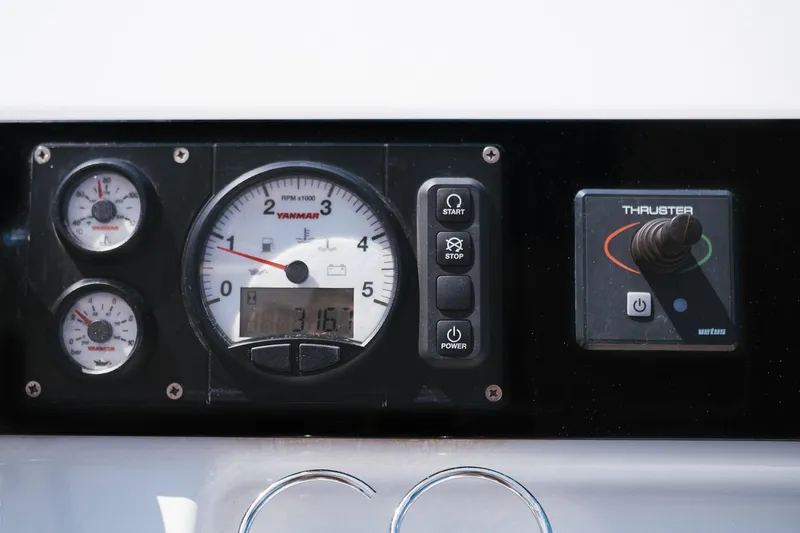 Almissa Yacht Photos Pics Control panel of 2023 Lagoon LAGOON 46 yacht with Yanmar gauges and thruster joystick.