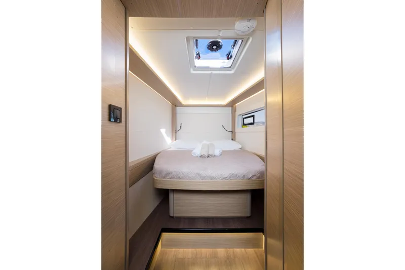 Almissa Yacht Photos Pics Luxurious cabin interior of 2023 Lagoon LAGOON 46 yacht with modern design and skylight.