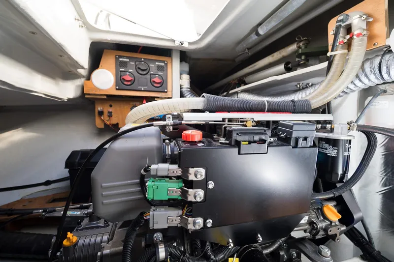 Almissa Yacht Photos Pics Engine room of 2023 Lagoon 46 yacht, showcasing mechanical components and control panel.