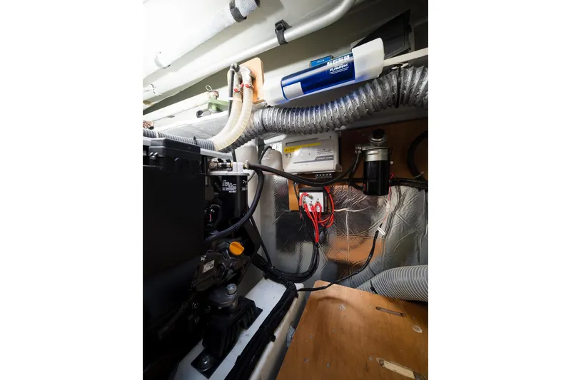 Almissa Yacht Photos Pics Engine compartment of 2023 Lagoon 46 yacht, featuring mechanical components and wiring.