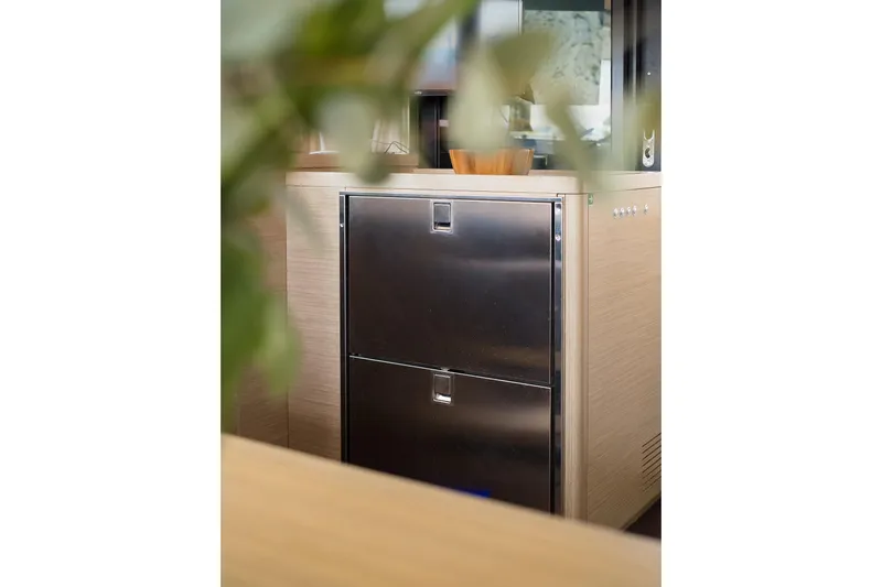 Almissa Yacht Photos Pics Modern kitchen interior of 2023 Lagoon 46 yacht with stainless steel appliances.