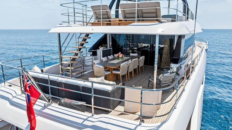 Double Up Yacht Photos Pics Luxurious 2024 Custom Line Navetta 33 yacht with spacious deck and elegant outdoor seating.