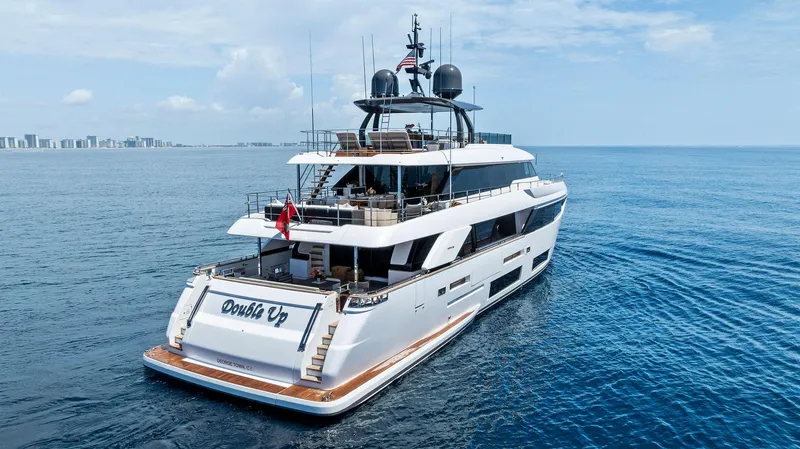 Double Up Yacht Photos Pics Luxurious 2024 Custom Line Navetta 33 yacht cruising on open sea.