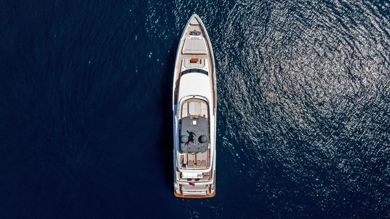 Double Up Yacht Photos Pics Aerial view of 2024 Custom Line Navetta 33 yacht on open water.