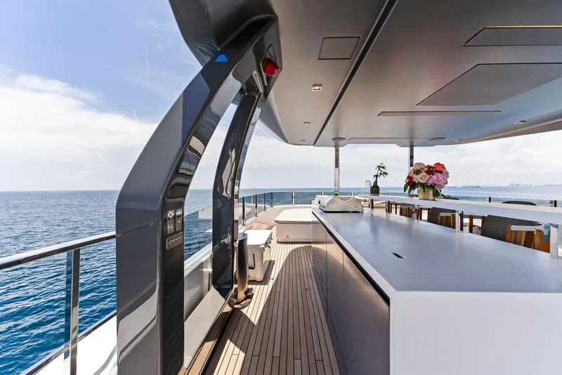 Double Up Yacht Photos Pics Luxurious 2024 Custom Line Navetta 33 yacht deck with ocean view and modern amenities.
