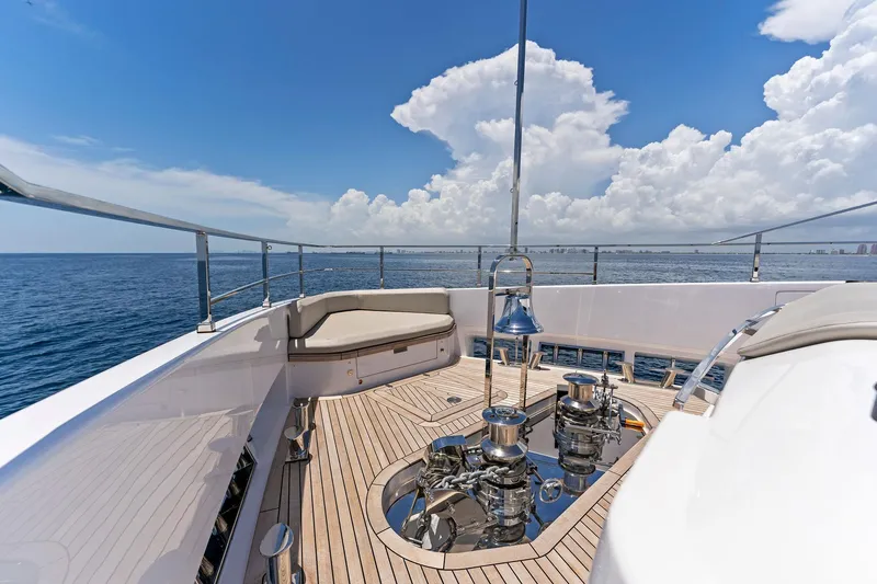 Double Up Yacht Photos Pics Luxurious 2024 Custom Line Navetta 33 yacht deck with ocean view and clear skies.