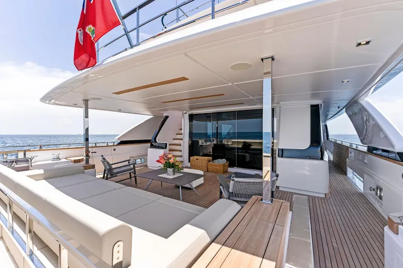 Double Up Yacht Photos Pics Luxurious 2024 Custom Line Navetta 33 yacht deck with elegant seating and ocean view.