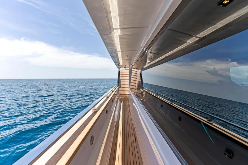 Double Up Yacht Photos Pics Custom Line Navetta 33 yacht, 2024 model, sleek deck view over open ocean.