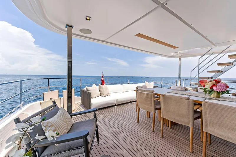Double Up Yacht Photos Pics Luxurious 2024 Custom Line Navetta 33 yacht deck with elegant seating and ocean view.