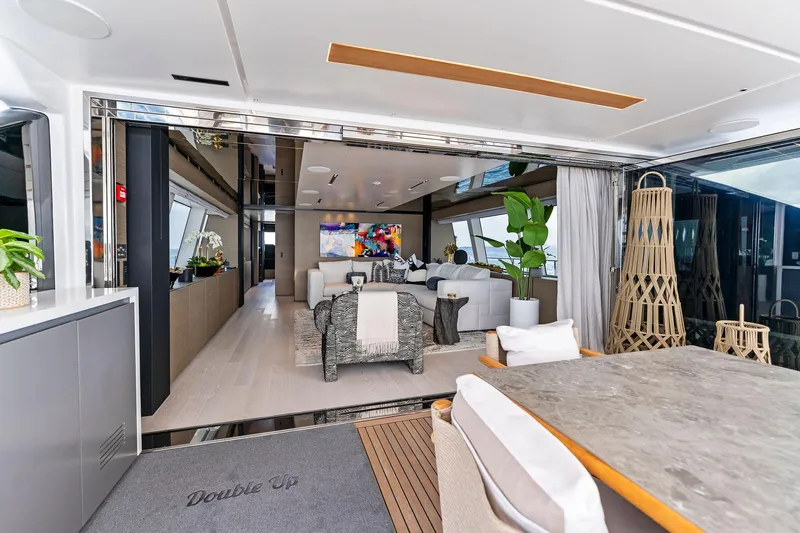 Double Up Yacht Photos Pics Luxurious interior of 2024 Custom Line Navetta 33 yacht with modern decor and spacious seating.
