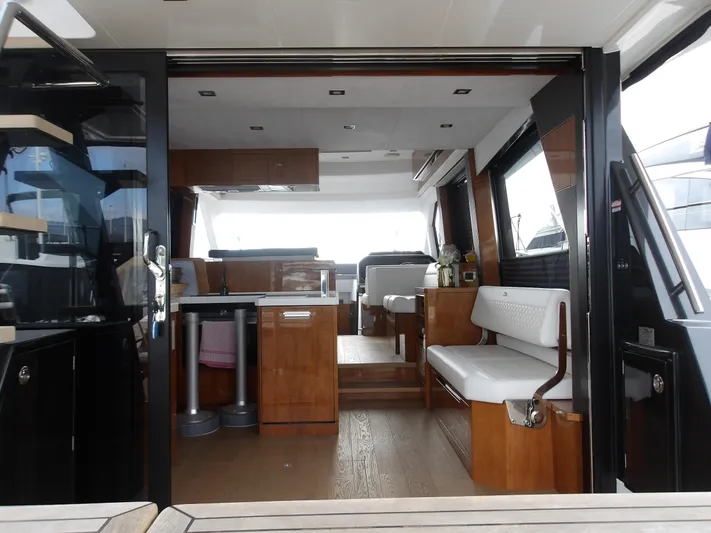  Yacht Photos Pics Interior view of 2023 Galeon 500 Fly yacht, featuring modern design and luxurious seating.