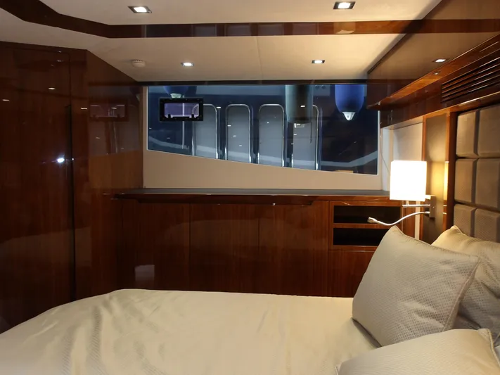  Yacht Photos Pics Luxurious cabin interior of 2023 Galeon 500 Fly yacht with elegant wood finishes.