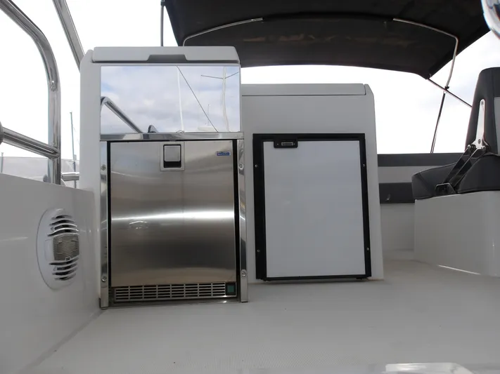  Yacht Photos Pics 2023 Galeon 500 Fly yacht interior with modern appliances and sleek design.