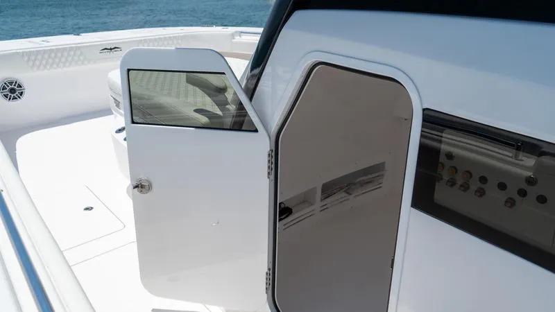  Yacht Photos Pics 2024 Invincible 40' Catamaran cabin door and deck view.