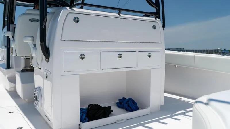  Yacht Photos Pics 2024 Invincible 40' Catamaran storage compartment with drawers and open space.