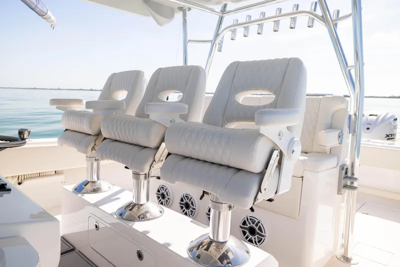 Double Bird Yacht Photos Pics 2020 Contender 44 ST boat with luxurious white seating and sleek design.